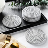 Grey cotton rope drink coaster set, multipurpose for tea and coffee. Stylish mats for cups and mugs on a table