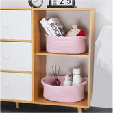 Pink cotton multi-purpose oval storage baskets (10x7x4 inches), perfect for organizing in bathroom, living room, kitchen or kids' toys