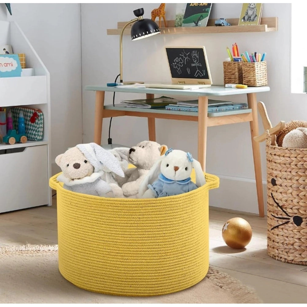 Yellow cotton laundry basket (14x12 inches, lid-less), perfect for clothes organization in living room, kitchen, or bathroom
