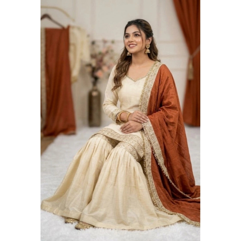Cream & Orange silk embroidered 3/4th sleeve V-neck kurti set with sharara pant and dupatta, intricate patterns on traditional Indian attire