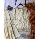 Cream & Orange silk embroidered kurti set with sharara pants and dupatta, features 3/4th sleeve V-neck design