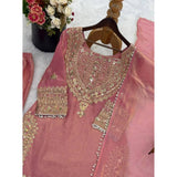 Pink silk embroidered 3/4th sleeve round kurti with sharara pant and dupatta set, calf length on model
