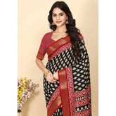 Black cotton silk printed saree with unstitched blouse, intricate design on traditional Indian attire