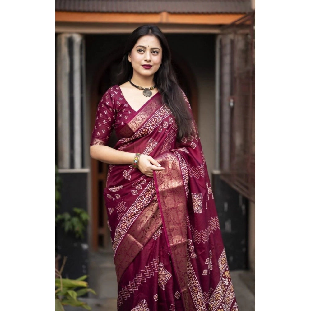 Women's wine-colored cotton silk printed saree with unstitched blouse, vibrant design on display