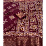 Women's wine-colored cotton silk printed saree with unstitched blouse, vibrant pattern showcased on mannequin