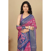 Women's pink cotton silk printed saree with unstitched blouse, vibrant floral design on display
