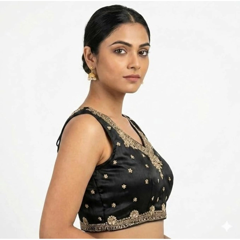 Black silk embroidered v-neck sleeveless blouse with padded detail, hook closure on display stand