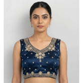 Blue silk embroidered V-neck sleeveless padded blouse with hook closure for women, close-up detail of intricate embroidery pattern