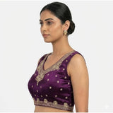 Women's wine silk embroidered V-neck sleeveless padded blouse (size 38), hook closure on display rack