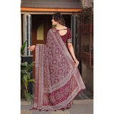 Maroon cotton silk floral printed saree with unstitched blouse, vibrant patterns showcased on model