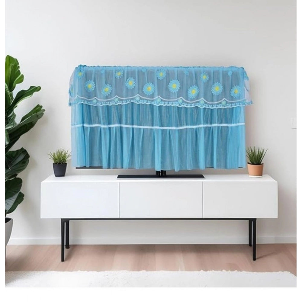 { "alt_text": "Blue fabric LED TV cover for 28-55 inch screens, seamless dust protection for living room entertainment area" }