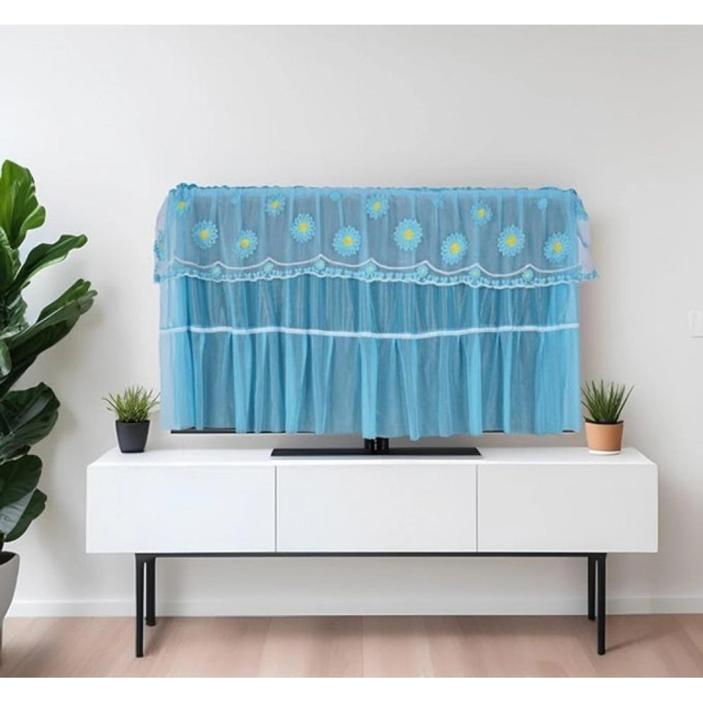 { "alt_text": "Blue fabric LED TV cover for 28-55 inch screens, seamless dust protection for living room entertainment area" }