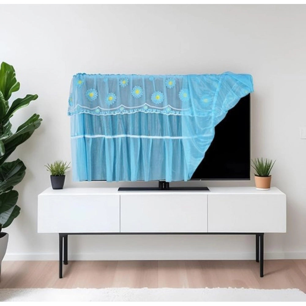 { "alt_text": "Blue fabric LED TV cover for 28-55 inch screens, seamless dust protection for living room entertainment area" }