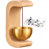 { "alt_text": "Gold magnetic doorbell with natural wooden base, adhesive door chime for home entrance or garden gate" }