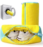 Yellow laundry shoe washing bag designed for use in washing machines and dryers, protecting shoes and machine.