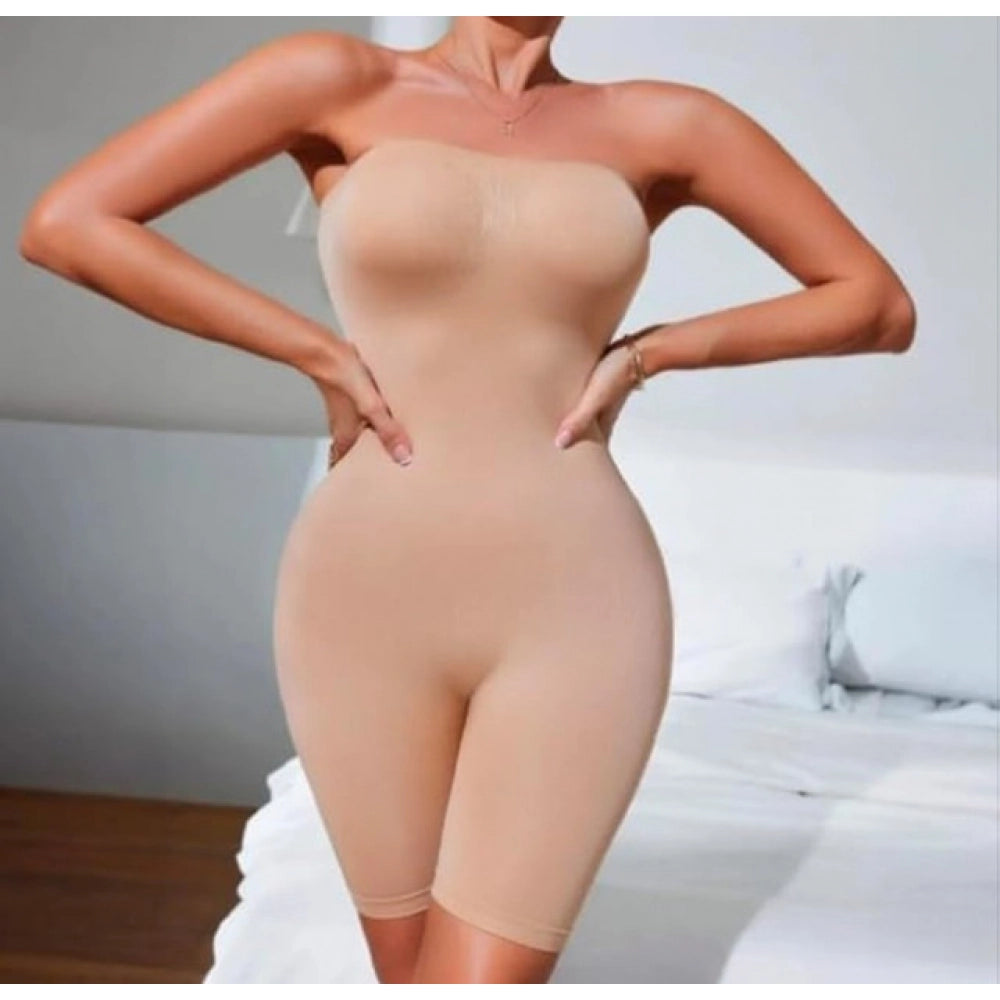 { "alt_text": "Beige seamless shapewear full suit, smoothing belly and waist, ideal for party wear and fitted outfits" }