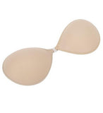 Beige and black adhesive silicone bra pads for strapless or backless dresses, providing a lifted and fuller look