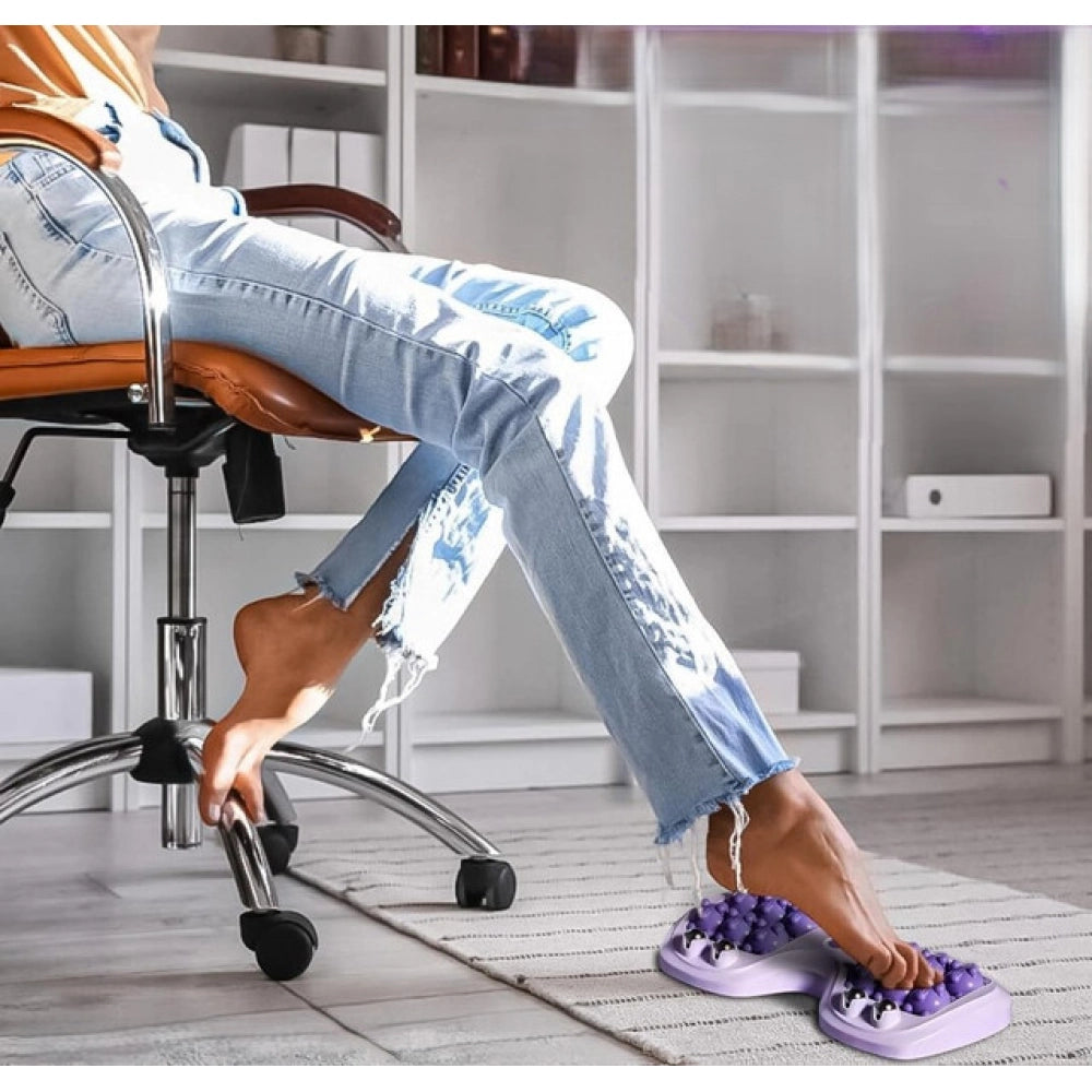 { "alt_text": "Purple plastic foot massage roller set of 2, portable deep tissue relief for home and travel" }