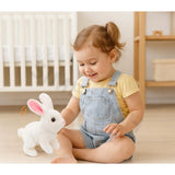 White interactive plush rabbit for playful learning, mimics sounds and moves around. Safe for babies, toddlers, and kids