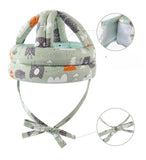 Green breathable baby safety helmet with shock-absorbing sponge and adjustable fit for toddlers