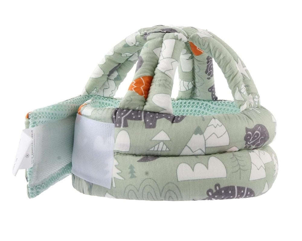 Green breathable baby safety helmet with shock-absorbing sponge and adjustable fit for toddlers