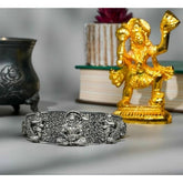 { "alt_text": "Silver metal half wrist kada for Lord Hanuman devotees, spiritual protection, and inner strength" }