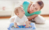 Multicolor sensory play mat for infants, featuring moving shapes and colors for motor skill development