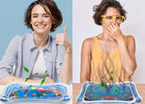 Multicolor sensory play mat for infants, featuring moving shapes and colors for motor skill development