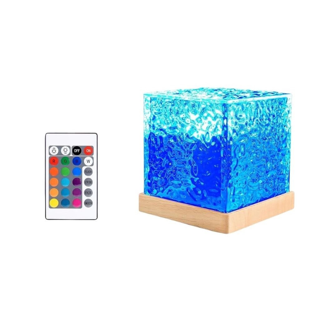 { "alt_text": "Blue acrylic lamp projecting dynamic ocean wave ripple effect, ambient mood lighting decor" }