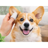 { "alt_text": "White non-toxic pet ear cleaning wipes for dogs and cats, alcohol-free dog hygiene product on hand" }