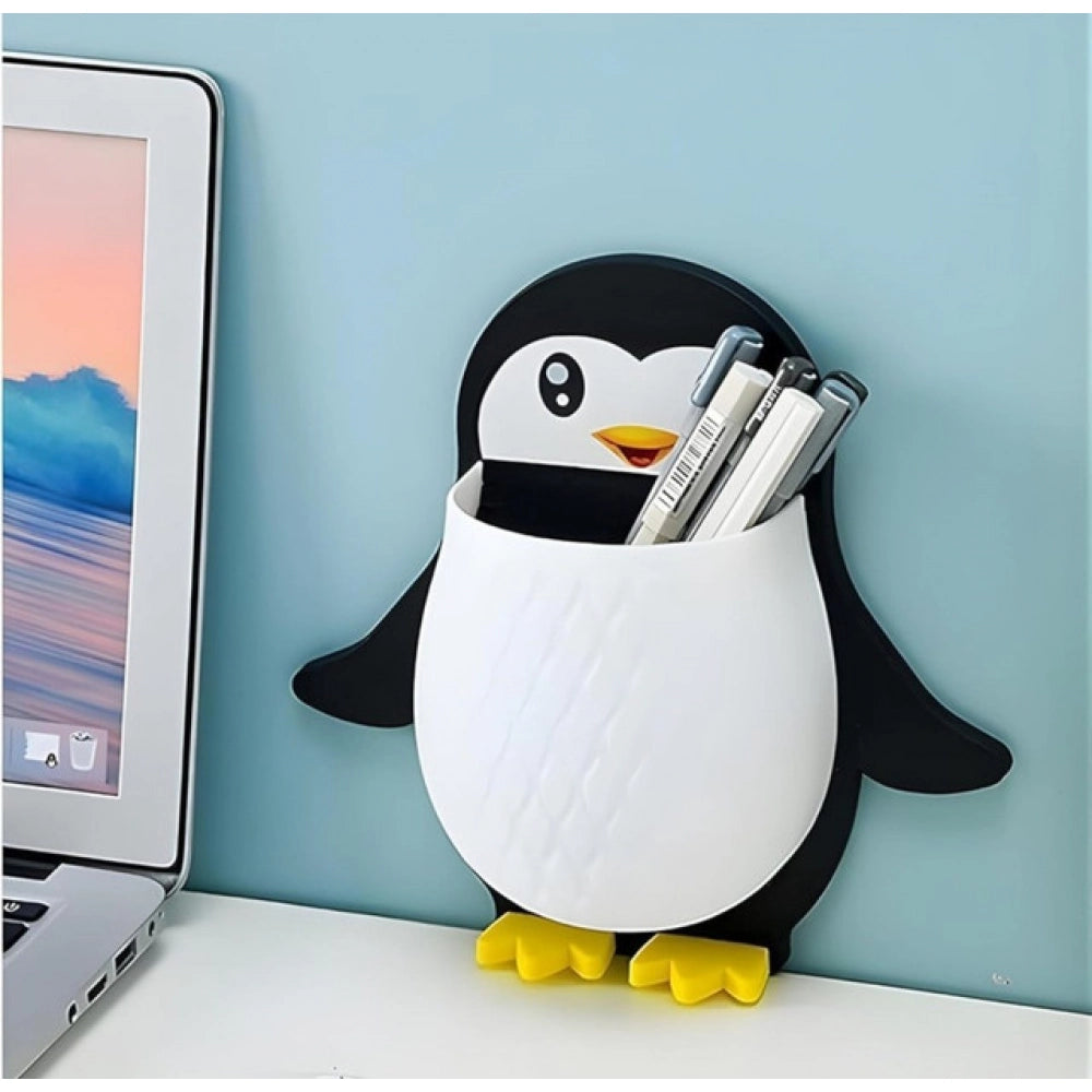 { "alt_text": "Multicolor plastic toothbrush holder set of 3, penguin design bathroom organizer for countertop storage" }