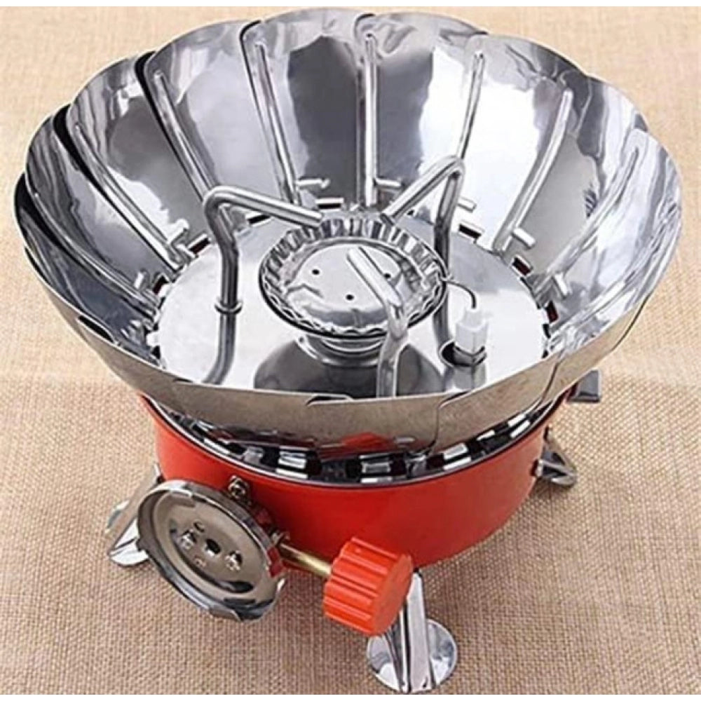 Orange folding windproof lotus stove, compact & lightweight, ideal for camping and trekking