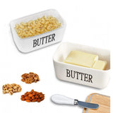 { "alt_text": "White ceramic butter box with bamboo lid, airtight storage container for fresh butter, kitchen countertop accessory" }