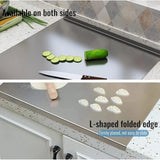 { "alt_text": "Silver stainless steel chopping board for kitchen prep, durable food preparation tool with built-in lip" }