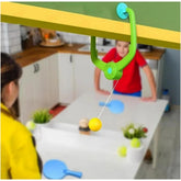 { "alt_text": "Green durable table tennis trainer for improving hand-eye coordination and catching skills" }