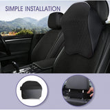 { "alt_text": "Black memory foam car headrest pillow for neck support, pain relief, and comfortable travel on long drives" }