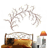 Yellow bendable willow vine light, tree branch layout with evenly spaced LED blossoms for bedroom mood lighting and decorative accent illumination. USB powered design with remote control for brightness and mode adjustment