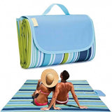 { "alt_text": "Blue smooth fabric picnic mat, spacious portable ground cover for family outings and camping" }