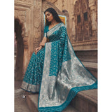 { "alt_text": "Teal art silk printed saree with unstitched blouse, 5.5m, ethnic wear, Indian traditional clothing" }