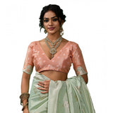 { "alt_text": "Pista green linen cotton printed saree with unstitched blouse, 5.5mtr ethnic wear, Indian traditional clothing" }