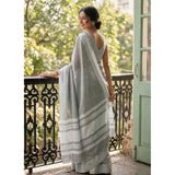 { "alt_text": "Gray linen striped saree with unstitched blouse, 5.5m linen ethnic wear for women" }