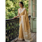 { "alt_text": "Mustard yellow linen striped saree with unstitched blouse, 5.5m linen fabric, ethnic wear" }