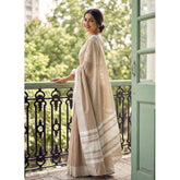 { "alt_text": "Lite brown linen striped saree with unstitched blouse, 5.5m linen ethnic wear for women" }