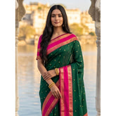 { "alt_text": "Dark green-pink silk blend printed saree with unstitched blouse, 5.5mtr ethnic wear for women" }