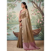 { "alt_text": "Brown tissue silk saree with unstitched blouse, solid design, 5.5 meter ethnic wear for women" }