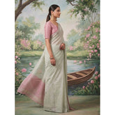 { "alt_text": "Silver tissue silk saree with unstitched blouse, solid design, 5.5 meter ethnic wear for women" }