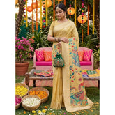 { "alt_text": "Yellow linen cotton saree with floral embroidery, unstitched blouse, 5.5mtr ethnic wear for women" }