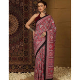 { "alt_text": "Maroon crepe printed saree with unstitched blouse, 5.5m, ethnic wear, Indian traditional clothing" }