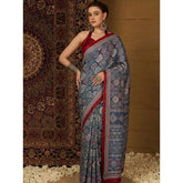 { "alt_text": "Navy blue crepe printed saree with unstitched blouse, 5.5m, ethnic wear, Indian fashion" }