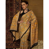 { "alt_text": "Yellow crepe printed saree with unstitched blouse, 5.5m, ethnic wear, Indian fashion, traditional drape" }